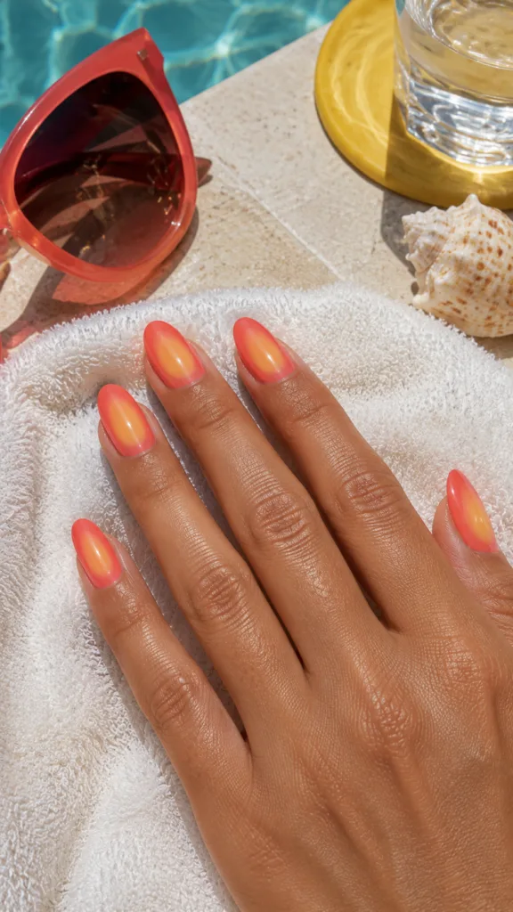10. Coral Aura Nails With Soft Yellow Centers
