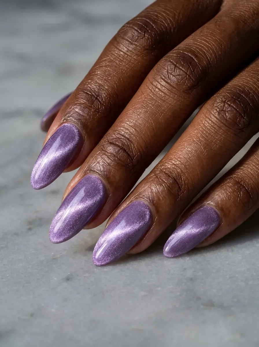 Long almond nails with reflective lavender velvet magnetic polish