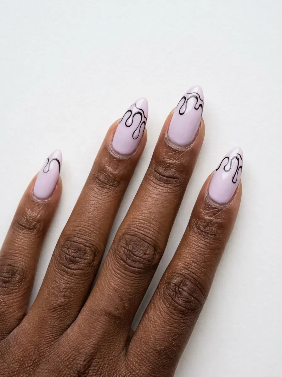 Long almond nails with lilac drip tips and black accent lines