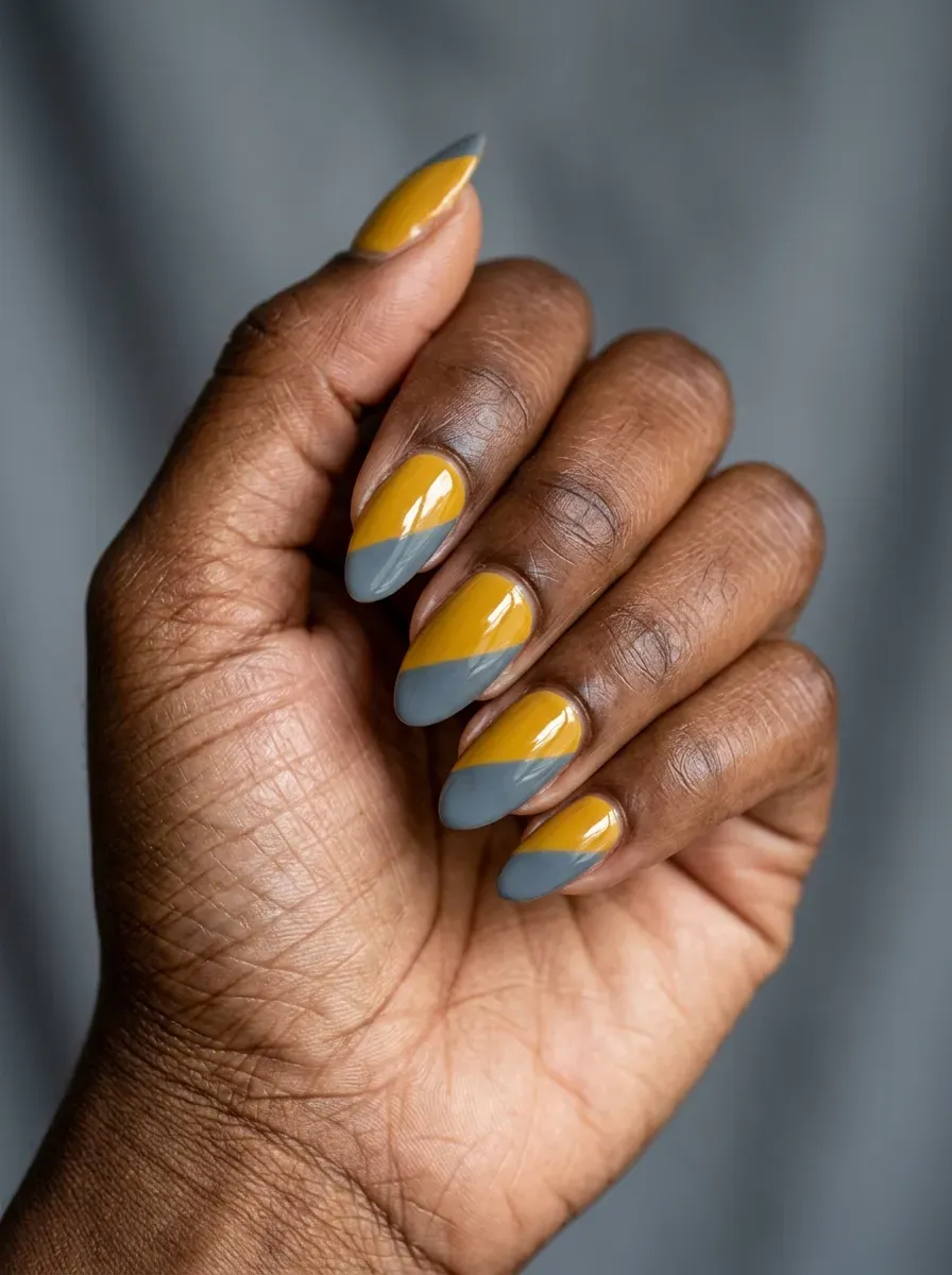 Two-tone color block nails split between mustard and slate gray