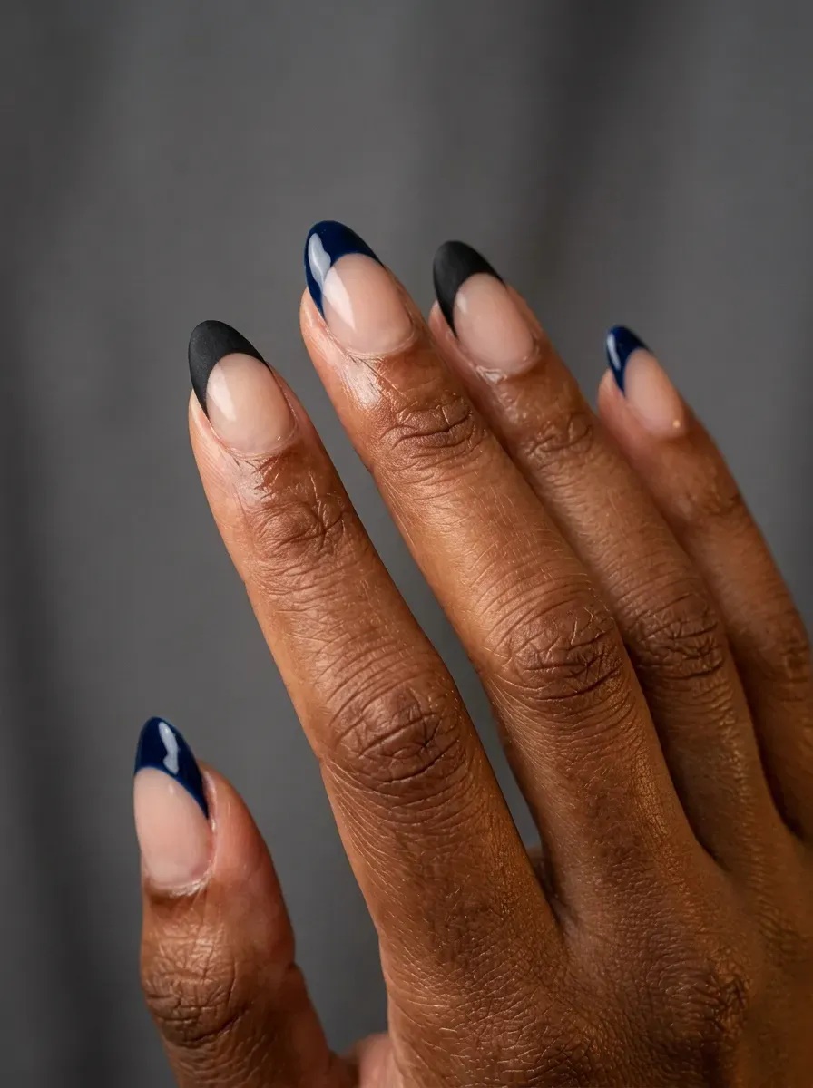 French tip nails alternating navy blue and black tip colors
