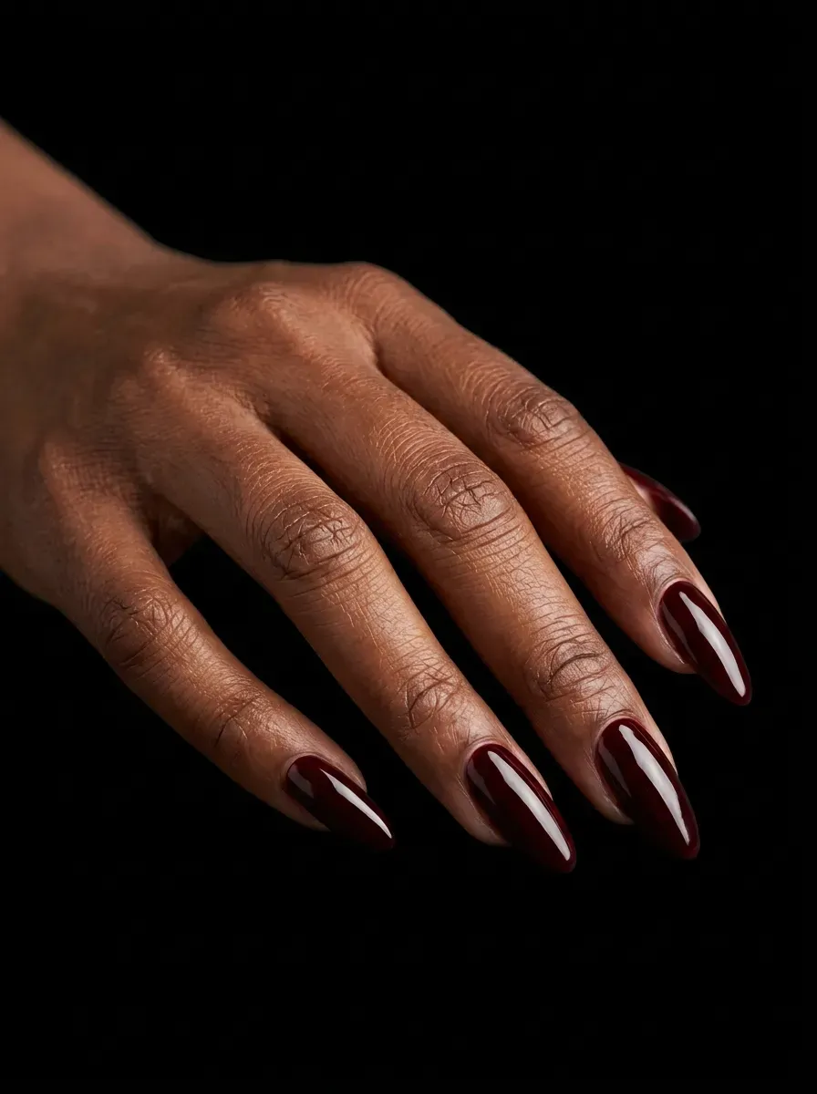 Black cherry almond nails with deep red glossy finish