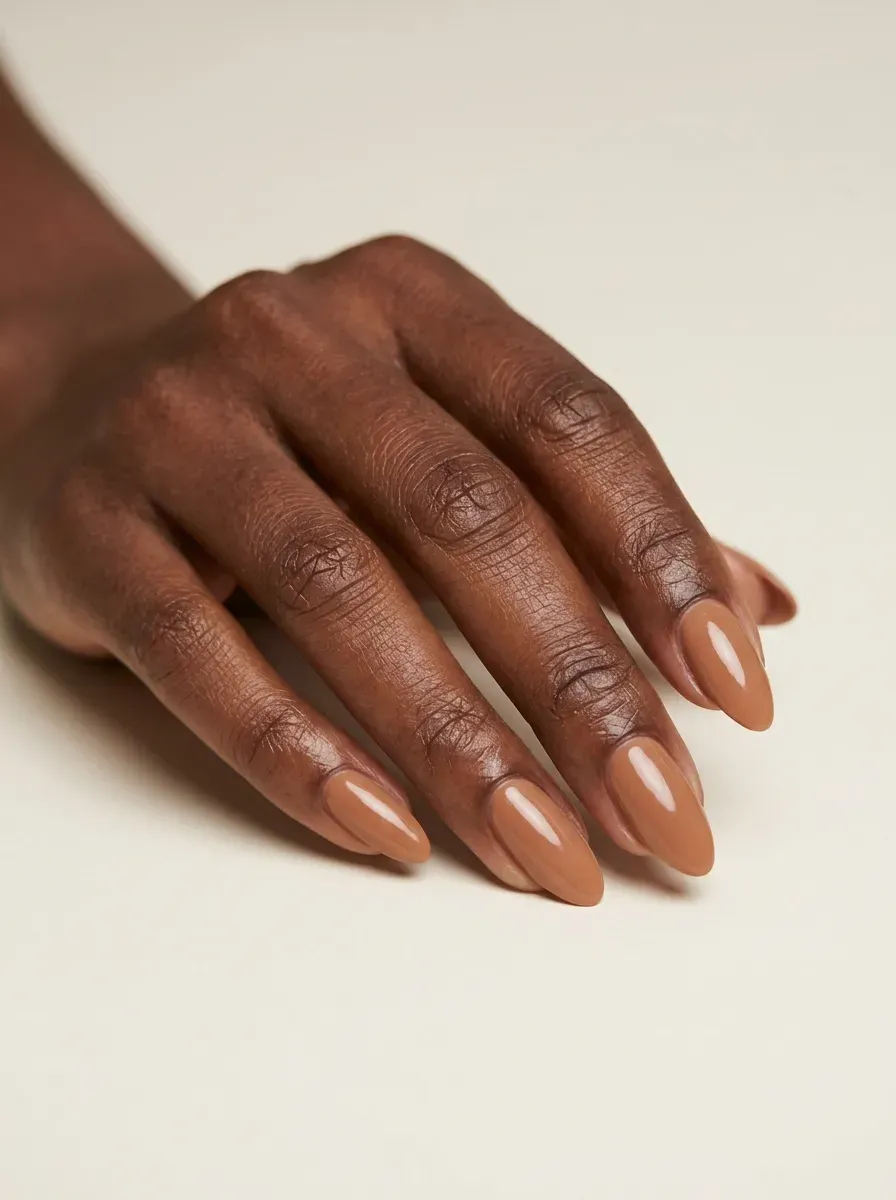 Burgundy micro French tips on short natural shaped nails