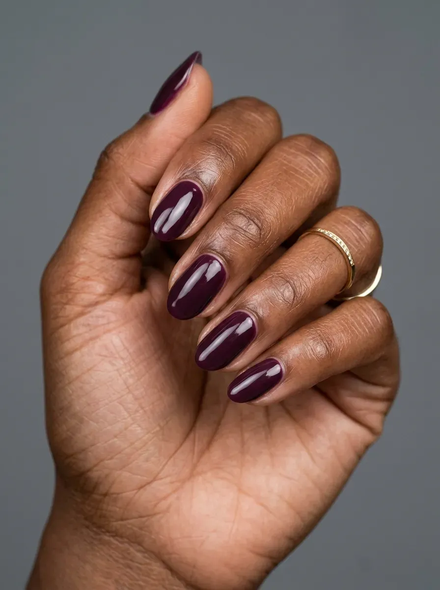 Moody plum gel manicure on medium length oval nails