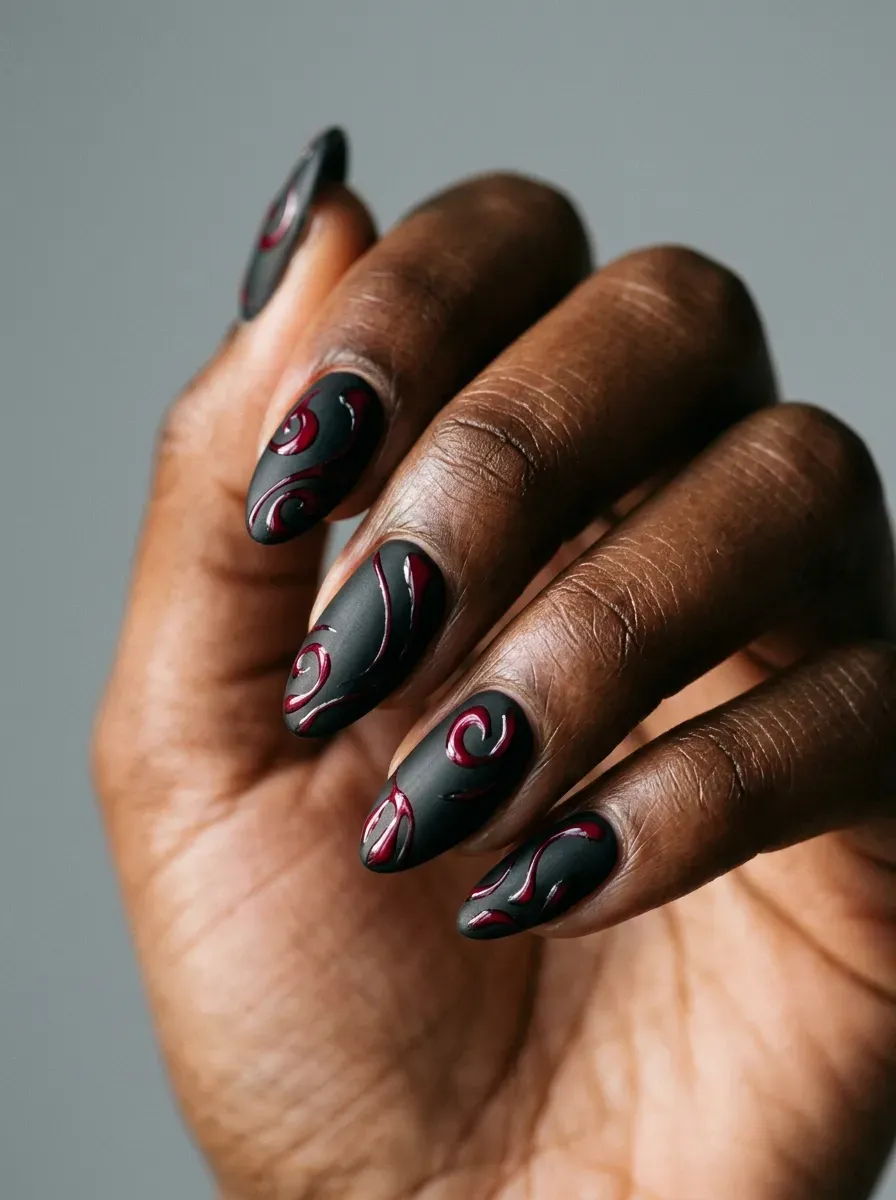Muted monster green nails with black graphic accents and glossy finish